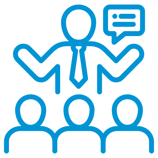 Person speaking to a group icon; shows three seated figures facing one standing figure with a speech bubble overhead.